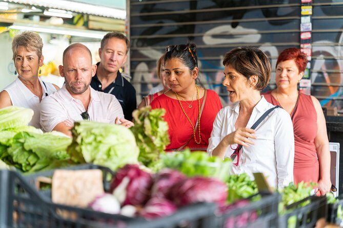 Cesarine: Market Tour & Cooking Class at Local's Home in Milan - Porta Romana market stop: Milan beyond the postcard center