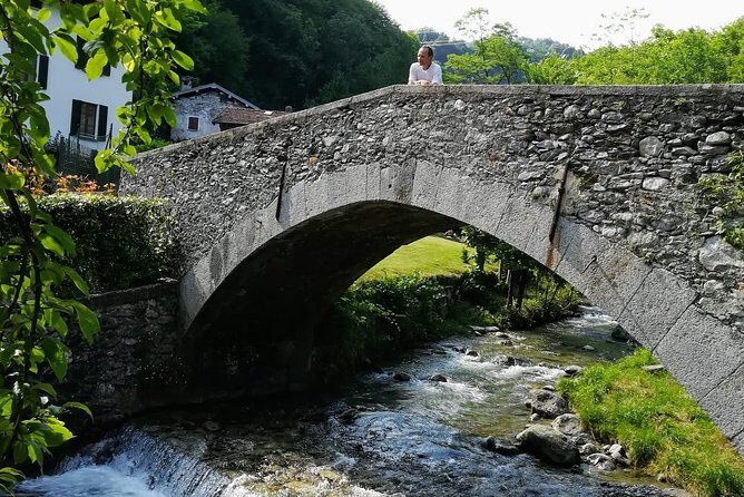 E-Bike Tour around Three Lakes and Idyllic Mountain Life - Lake Lugano first glimpse: steep panoramic drops and fresco side roads