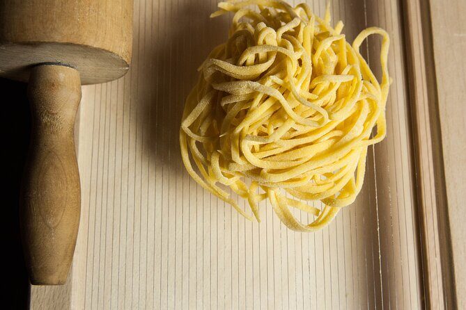 Fresh Homemade Pasta and Tiramisu Cooking Class in Milan - The meal includes wine and water, with clear age rules