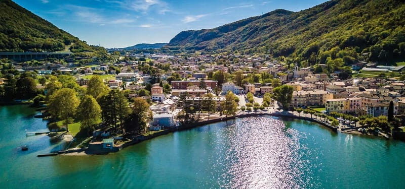 From Milan: Bellagio & Lugano with Lake Como Private Cruise - Getting There Comfortably: Luxury Bus, Headphones, and Real Timing