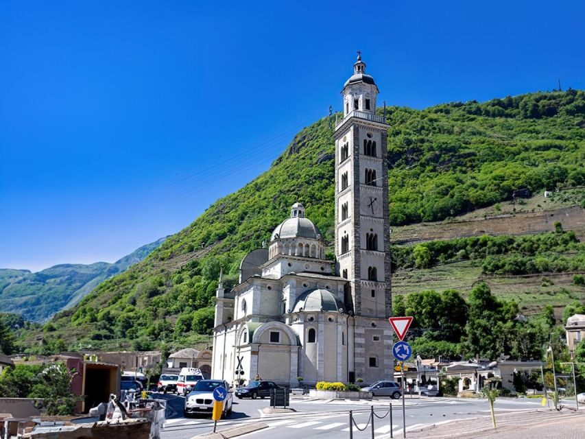 From Milan: St Moritz & Alps Day Trip with Bernina Red Train - Tirano in 45 minutes: medieval streets and a market-style reset