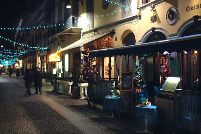 Milan by night walking experience - Meeting at Filarete Tower and Heading Toward Piazza del Duomo