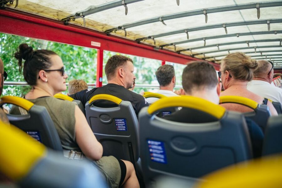 Milan: City Sightseeing Hop-On Hop-Off Bus with Audio Guide - Line C (Castello to San Siro): parks, City Life, and stadium energy