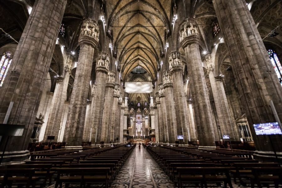 Milan Duomo Cathedral Tour - Exterior storytelling: statues, spires, gargoyles, and the Holy Nail