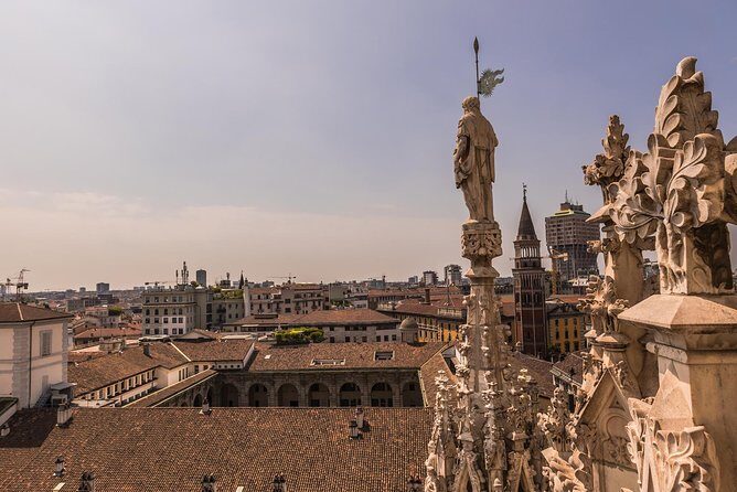 Milan Duomo Rooftop Terrace Guided Tour - Meeting at Mondadori Duomo: Easy Start, Strict Rules