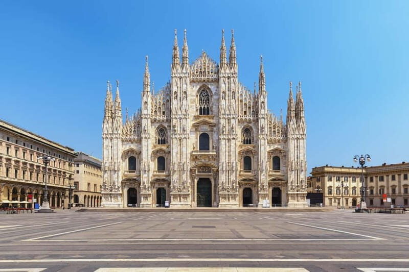 Milan: Fast Track Cathedral and Duomo Rooftop Guided Tour - Rooftop terraces by elevator: spires, Madonnina, and city scale