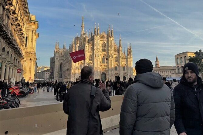 Milan Highlights: Guided Duomo, Last Supper & City Centre Tour - Outside Sforza Castle: a dramatic fortress view with park time built in