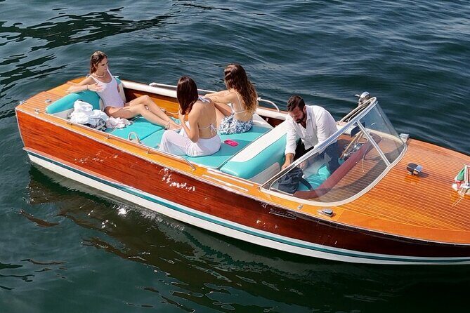 Private tour in classic wooden boat - Meeting Point on Lungo Lario Trieste and Timing Tips