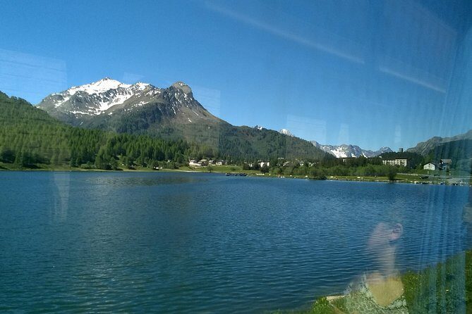 Private tour to Bernina train & Lake Como. Hotel pick-up - The RED TRAIN ride: climbing toward Piz Bernina and the highest rail point